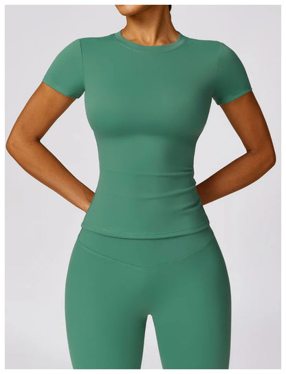 Elevate your fitness wardrobe with the NCLAGEN Short Sleeve T-Shirt, featuring a stylish round neck and fitted silhouette. Made from lightweight, breathable nylon, this versatile gym wear is perfect for yoga, running, or casual outings. Available in a range