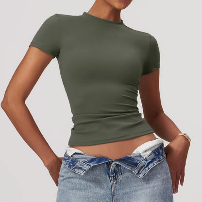 Elevate your activewear collection with the NCLAGEN Short Sleeve T-Shirt! Crafted from lightweight, breathable nylon, this fitted tee offers ultimate comfort and a flattering silhouette. Perfect for workouts, yoga, or casual outings, it transitions seamlessly through all seasons