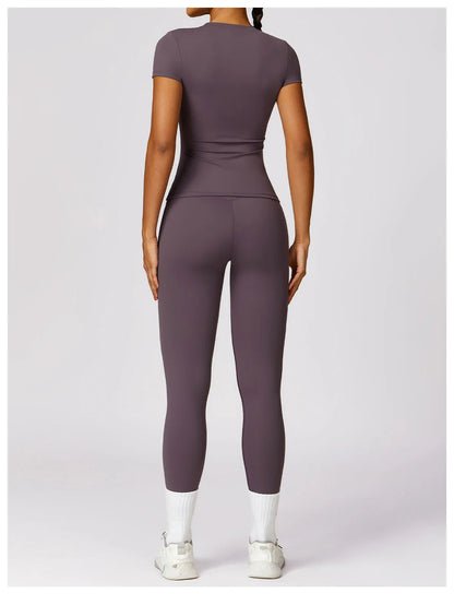 Elevate your workout wardrobe with the NCLAGEN Short Sleeve T-Shirt! This stylish and breathable gym top is designed for maximum comfort during any activity, from yoga sessions to running. Featuring a flattering fitted silhouette and round neck, it offers both performance and