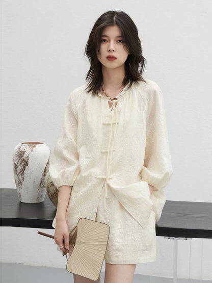 Elegant embroidered Chinese blouse and shorts set, showcasing intricate craftsmanship and a contemporary design. Made from soft, breathable fabric for ultimate comfort, this relaxed fit outfit flatters every silhouette. Perfect for chic summer outings or casual gatherings, it's a must-have addition to