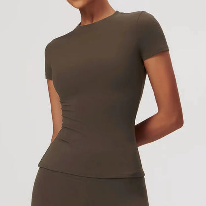 Elevate your fitness game with the NCLAGEN Short Sleeve T-Shirt, crafted from lightweight, breathable nylon for ultimate comfort. This stylish gym wear features a flattering fitted silhouette and a round neck design, perfect for yoga, running, or casual outings.