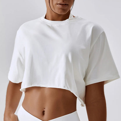 Stylish NCLAGEN Casual T-shirt in a chic crop design, perfect for yoga, dance, or running. Made from soft, breathable cotton and spandex, it offers a loose fit for unrestricted movement. Stay fresh and confident during workouts or casual