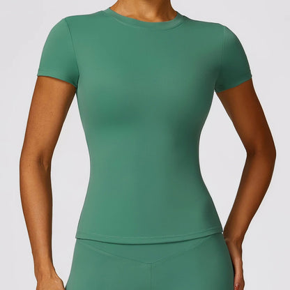 Elevate your workout wardrobe with the NCLAGEN Short Sleeve T-Shirt! This stylish and breathable gym essential features lightweight nylon for ultimate comfort, ensuring you stay cool during any activity—from yoga to running. With a fitted silhouette and round neck design, this