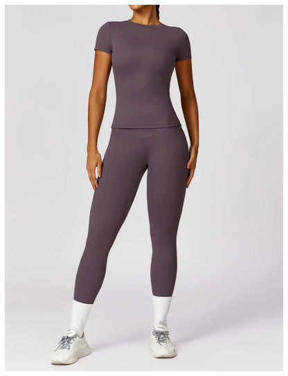 Stylish short sleeve t-shirt designed for ultimate performance and comfort. Made from lightweight, breathable nylon, this fitted gym wear is perfect for workouts, yoga, or casual outings. Available in a flattering silhouette, it ensures freedom of movement while keeping you cool