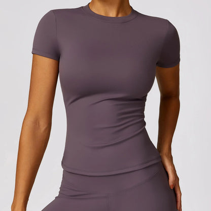 Elevate your workout wardrobe with the NCLAGEN Short Sleeve T-Shirt! This stylish and breathable gym essential is crafted from lightweight nylon, ensuring maximum comfort during any activity, from yoga to running. With a fitted silhouette and round neck design, it flat