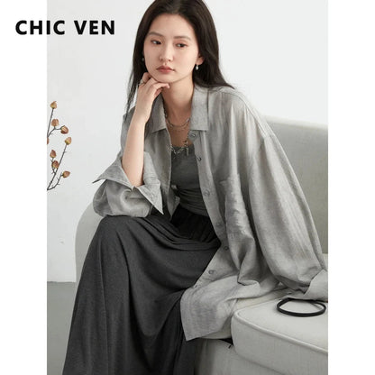 Elevate your summer wardrobe with the Textured Long Sleeve Blouse with Split Collar. This chic blouse showcases an eye-catching tie-dye pattern and is crafted from soft, breathable fabric for all-day comfort. The modern split collar adds a trendy twist,